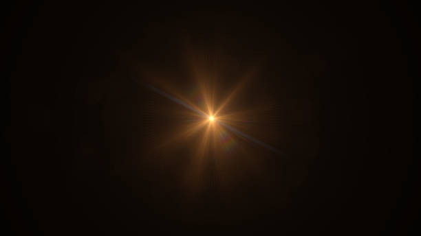 黒の背景に太陽レンズ フレア光特殊効果 - looking at view flash ストックフォトと画像