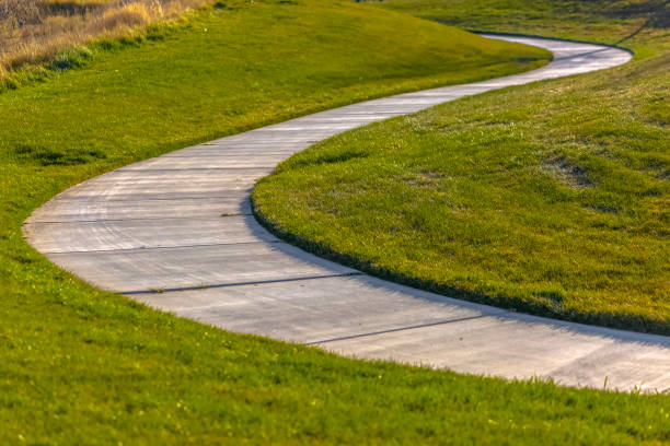 istock S curve of sidewalk flows to the background 1085518950