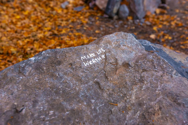 istock Make life worth it written on a rock seen on hike 1085518962