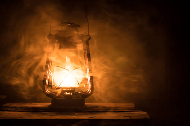 kerosene lamp with old wooden wall - oil lantern imagens e fotografias de stock