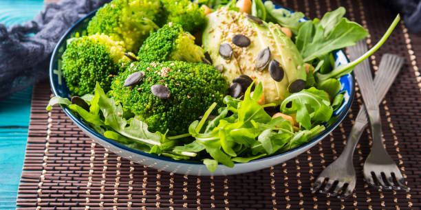 istock Green plant based salad with broccoli and avocado 1085524812