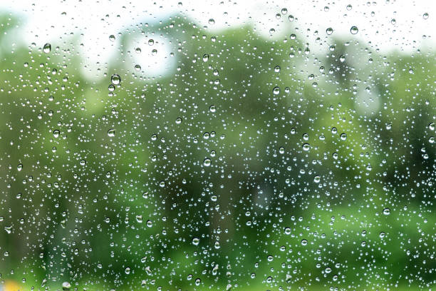 istock Close-up Rain Drop On Glass As Background 1085533458