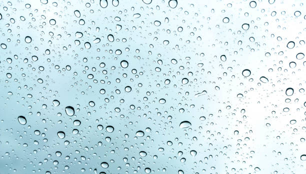 close-up rain drop on glass as background - wet dew drop steam imagens e fotografias de stock