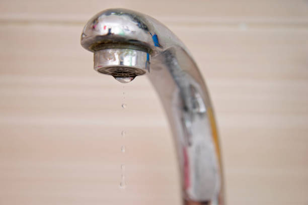 istock Drops of water falling down from the crane 1085534108