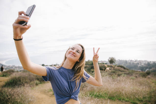 istock Woman Taking Selfie on Phone 1085540324