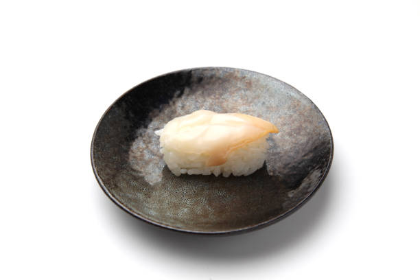 istock sushi of whelk isolated on white background 1085545110
