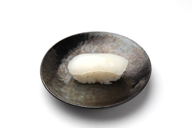 istock sushi of squid isolated on white background 1085546136
