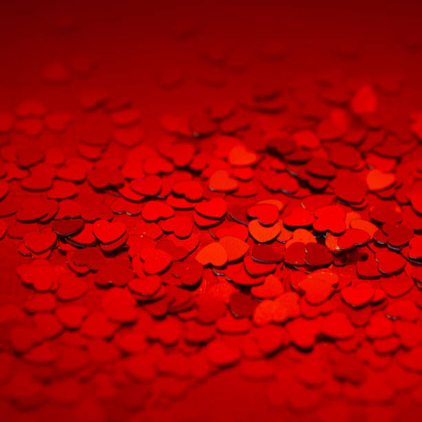 istock Red hearts confetti texture. Happy Valentines day background. 1085546548