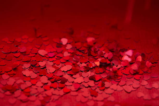 istock Red hearts confetti texture. Happy Valentines day background. 1085546610