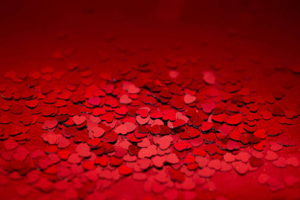 istock Red hearts confetti texture. Happy Valentines day background. 1085546618