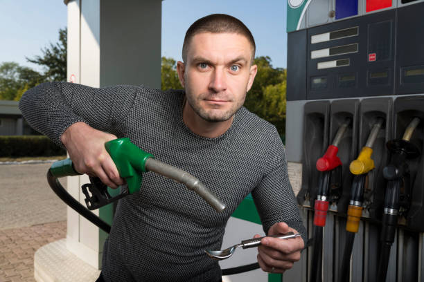 istock Emotional man at the gas station 1085555470
