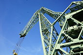 industrial-kran-gegen-den-blauen-himmel.jpg?b=1&s=170x170&k=20&c=RIgp6d6P-JEgcqZiQcwYeYXkJBGeSK-P5lKfZI-FJeI=