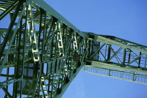 istock Industrial crane against blue sky 1085563080