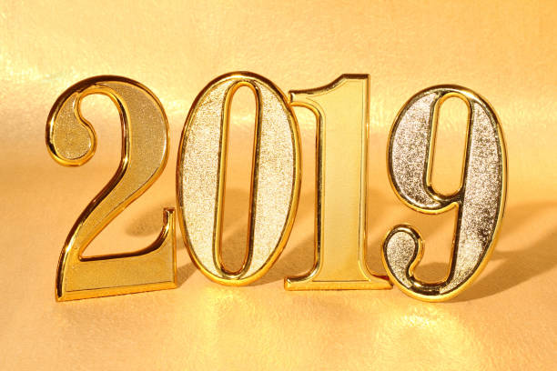 istock 2019 gold numbers text on gold background 1085571368
