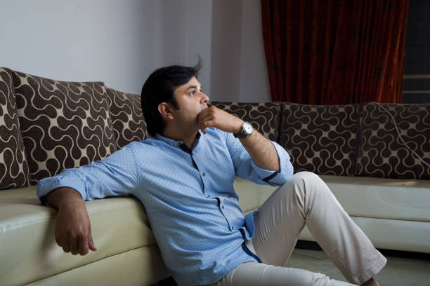 Indian, Males, Thinking, Sitting Sofa,