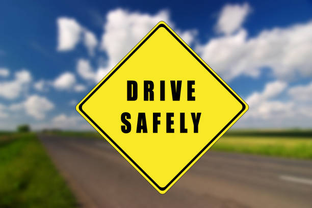 istock Empty road with yellow traffic sign, with drive safely text 1085579204