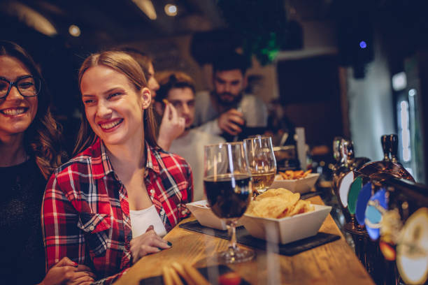 istock Group of friends standing at the bar 1085586768