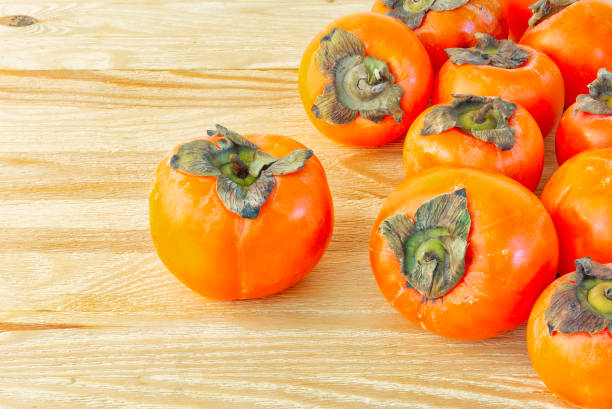 istock Ripe juicy and sweet persimmon fruit 1085591882