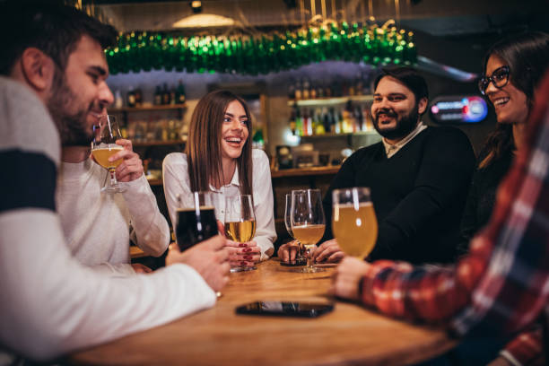 istock Group of friends in pub 1085591980