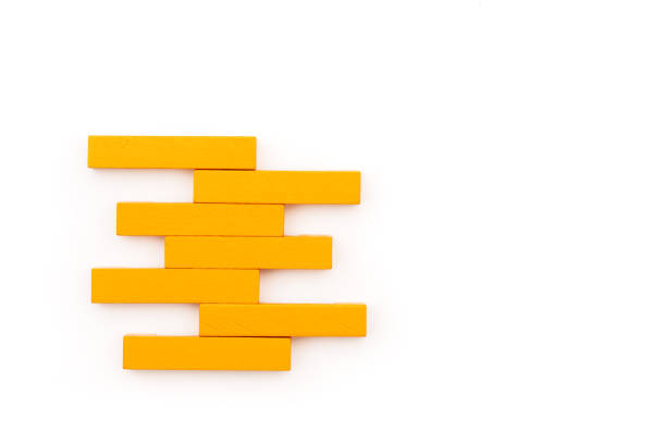 Leadership business concept. yellow wooden block stacking on white background