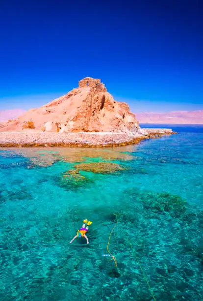 Beautiful amazing nature background. Tropical blue water. Red sea. Holiday resort. Island coral reef. Fresh  freedom. Adventure day. Luxury paradise. Inspiring wilderness. People snorkeling.