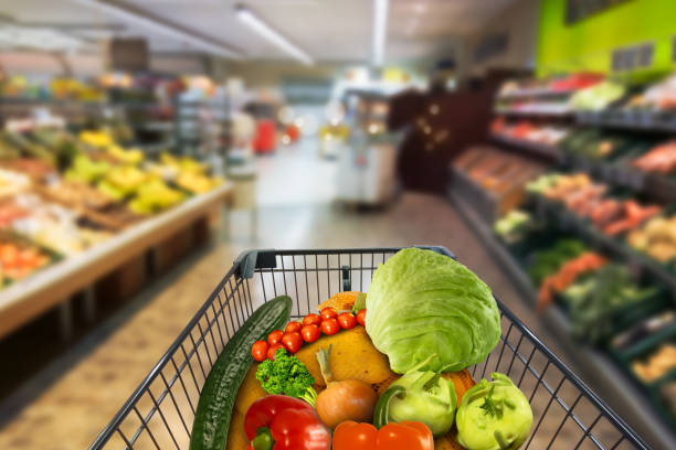 istock vegetables in shopping card in supermarket 1085594932