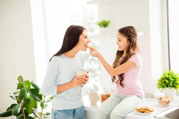 istock Charming adorable attractive beautiful kind young smiling mum, h 1085595092