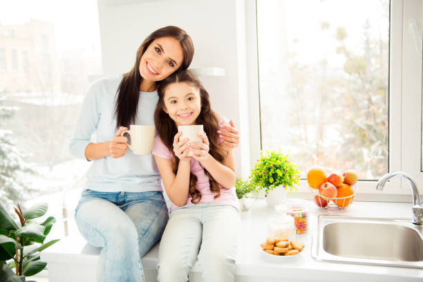 istock Charming adorable attractive beautiful kind young mom mum huggin 1085596394