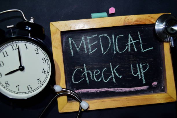 istock Medical Check up handwriting on chalkboard on top view 1085598118
