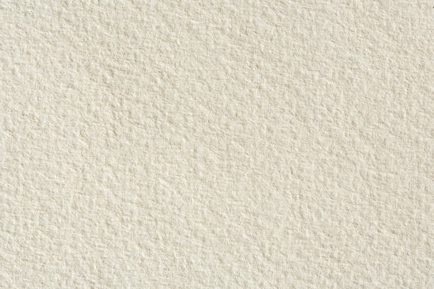 istock Paper texture background in light cream tone. 1085611376