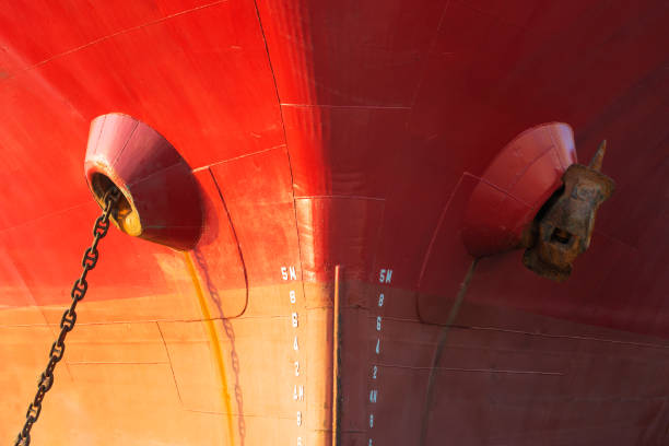 istock Ship chained at dock displays matching colors. 1085611626