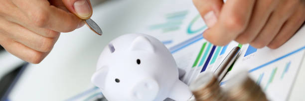 istock Hand businessman putting pin money 1085613418