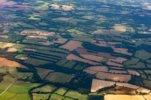 istock british countryside farmed fields aerial view 1085620262
