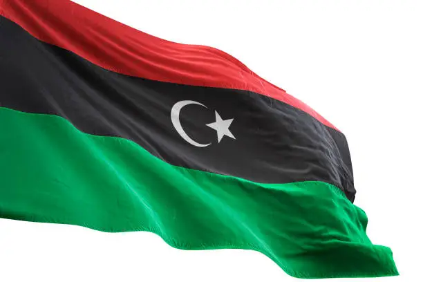 Photo of Libya flag close-up waving isolated white background