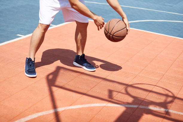 istock young adult practicing basketball skill 1085629806