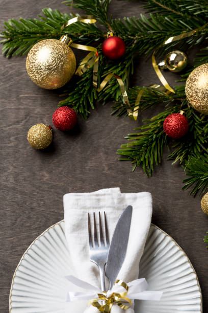 istock Christmas table setting with fork and knife and christmas decorations on plate 1085631846