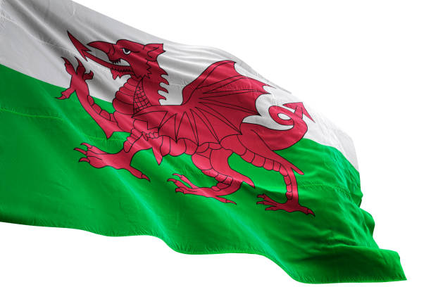 istock Wales flag close-up waving isolated white background 1085634522