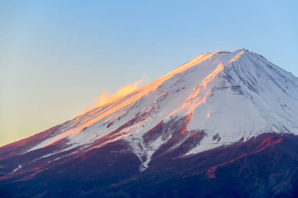 istock Fuji mountain with snow cover on the top 1085640274
