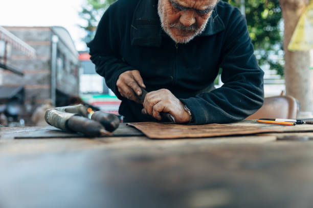 istock Senior Manual Worker to From Relief Carving 1085643166