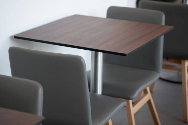 istock Empty wooden tables and wooden chairs in a cafe 1085644476