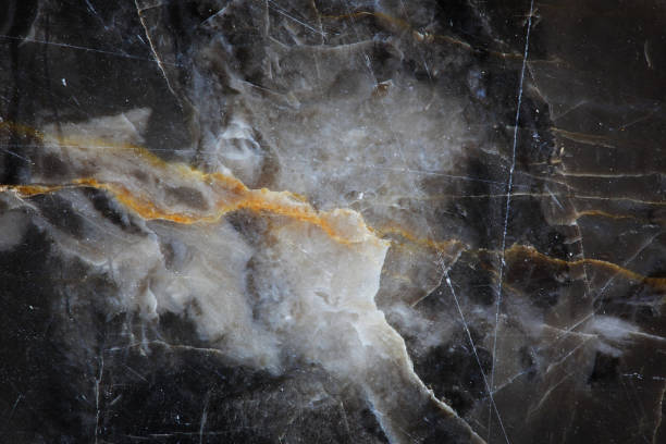 istock Yellow and white Patterned natural of dark gray marble (Gold Russia) texture background 1085650154