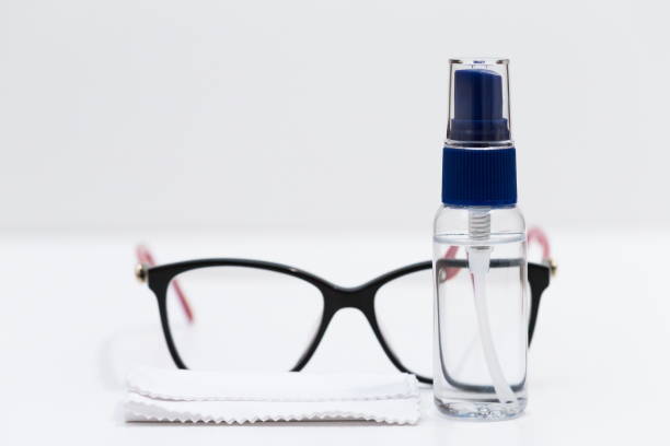istock Glasses, napkins, liquid in a bottle, white background 1085653298
