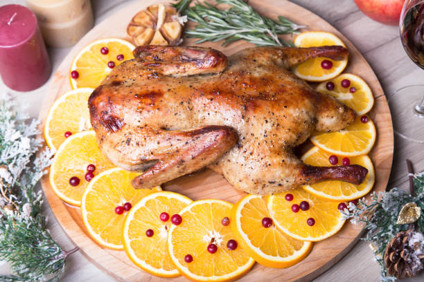 istock Christmas duck with oranges and cranberries baked whole. 1085655160