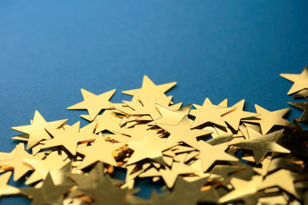 istock Golden stars on black background 1085655246