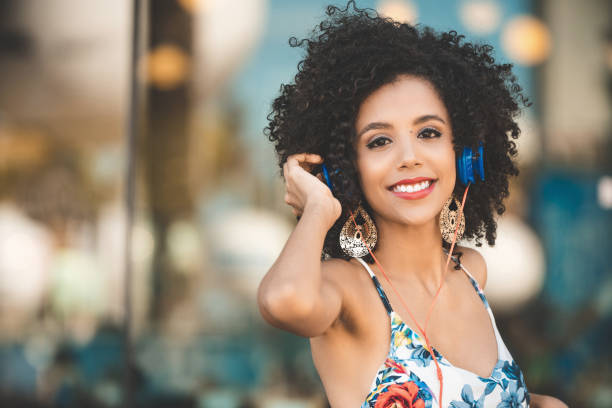 istock Woman listening music 1085656516