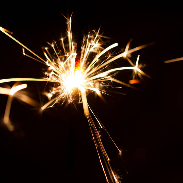 istock Christmas sparkler isolated on black background. Bengal fire 1085659908