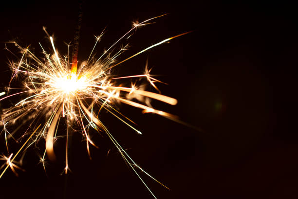 istock Christmas sparkler isolated on black background. Bengal fire 1085659922