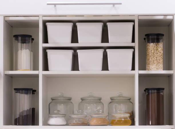 istock Interior. Jars and and boxes in the kitchen cupboard 1085673448