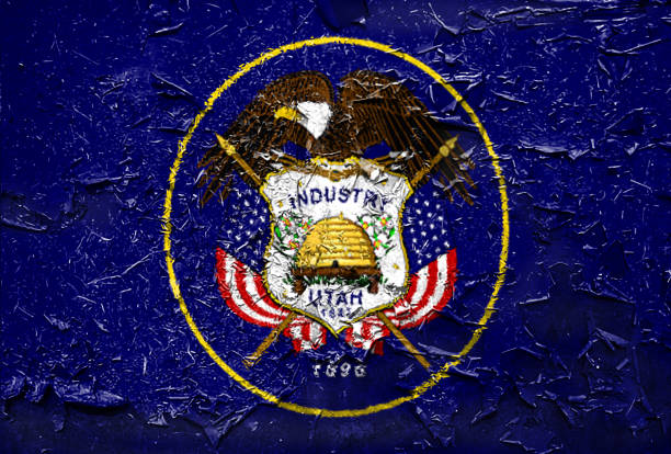 Utah state Flag emblem on metallic texture Utah state Flag emblem on metallic texture with displace utah state university stock pictures, royalty-free photos & images