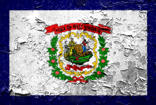 istock West Virginia State Flag emblem on metallic texture 1085679020